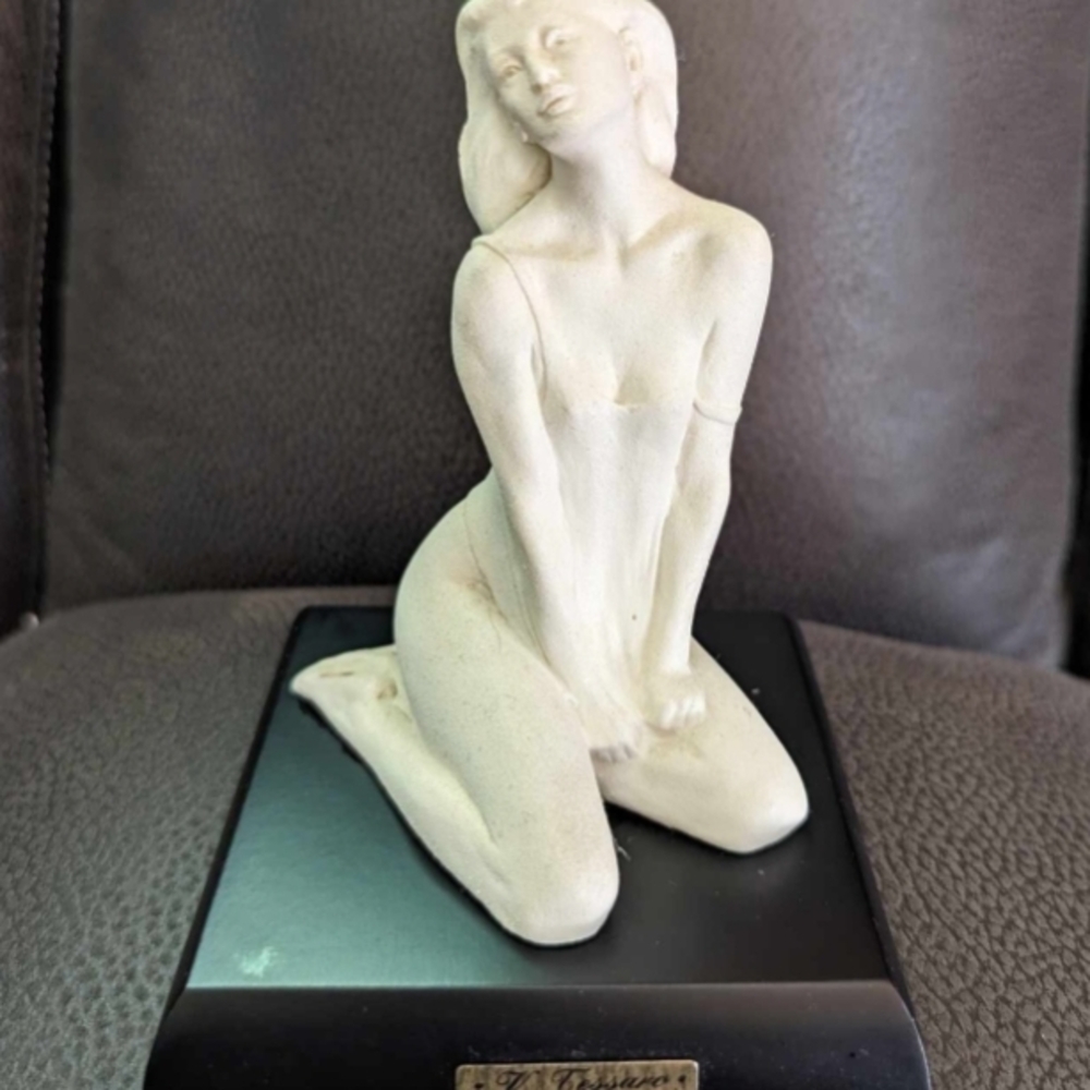 Elegant Cream Figurine on Black Base